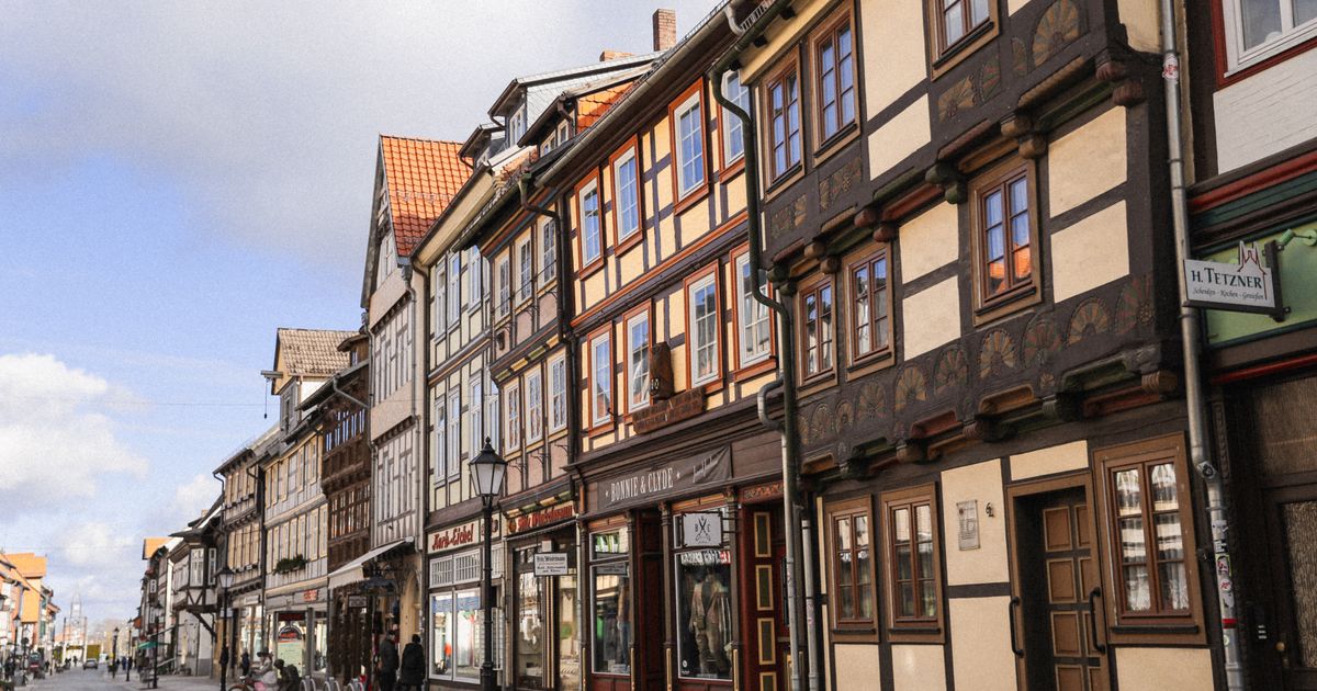 Beautiful street view of historic half-timbered buildings in a quaint German town.